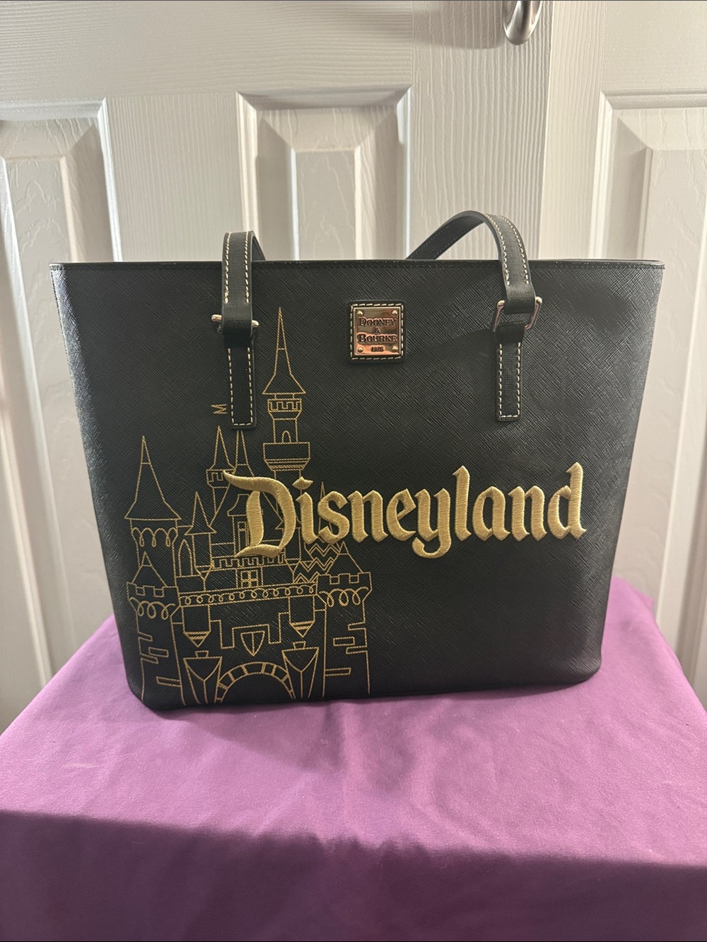Dooney & Bourke Black Tote with Gold Disneyland Script